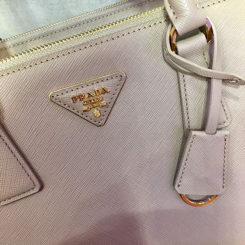 Pra*a top handle bags